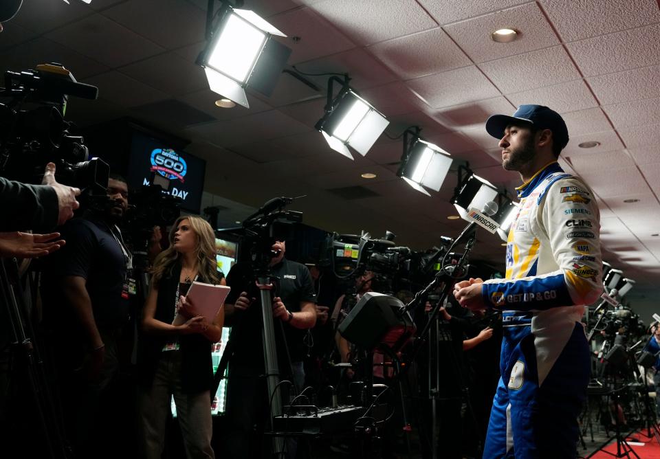 Chase Elliott answers questions from reporters at Daytona International Speedway on Feb. 14, 2024.