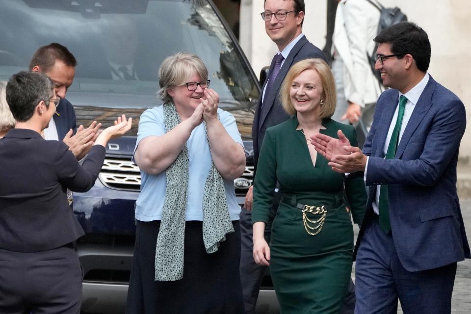 Britain's Secretary of State for Foreign, Commonwealth and Development Affairs, Liz Truss receives applause from her team near Parliament in London on July 20, 2022. Britain’s Conservative Party has chosen Rishi Sunak and Liz Truss as the two finalists in an election to replace Prime Minister Boris Johnson. The pair came first and second in a vote of Conservative lawmakers on Wednesday.