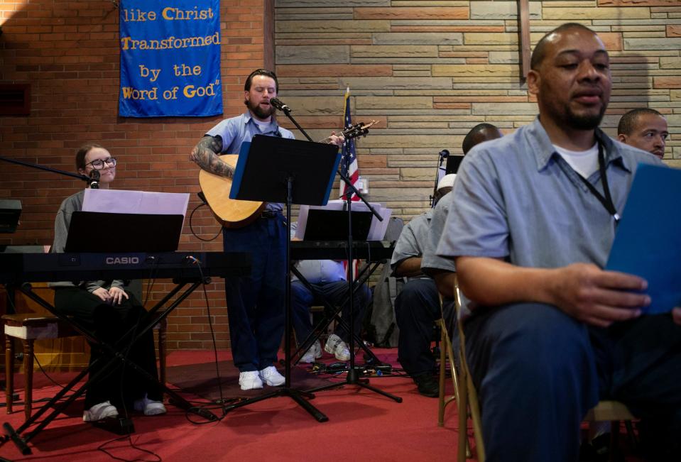 Incarcerated adults of the Day Treatment Program Chillicothe Correctional Institution performs songs for family members, staff and other incarcerated individuals during the DTP Winter Concert in the Chillicothe Correctional Chapel on January 25, 2024, in Chillicothe, Ohio.