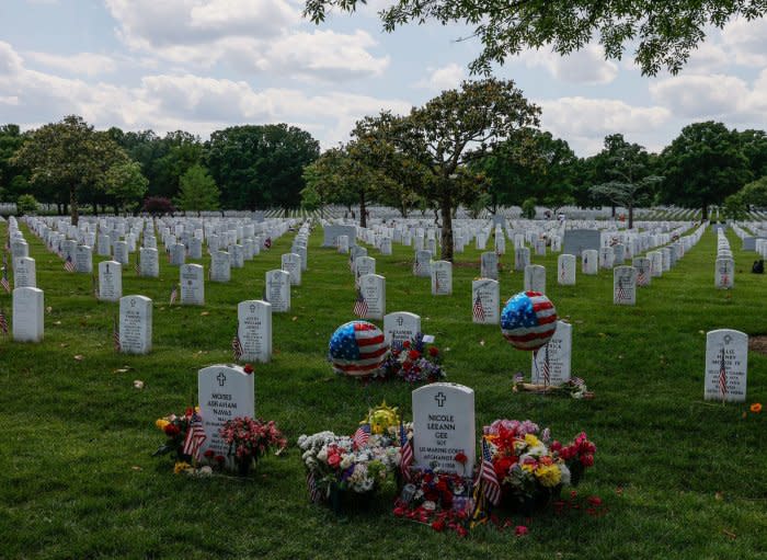 Flowers and balloons can be seen on the the grave of Marine Corps Sgt. Nicole L. Gee at Arlington National Cemetary's Section 60. Gee was one of 13 U.S. service members killed outside of Kabul's airport on August 26, 2021. File Photo by Jemal Countess/UPI