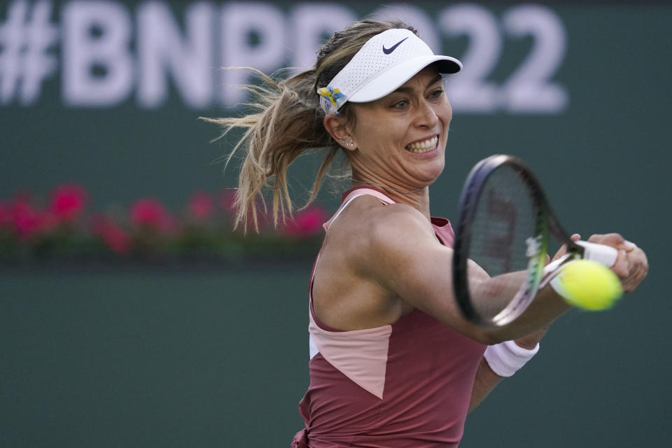 Paula Badosa, of Spain, returns a shot to Tereza Martincova, of the Czech Republic, at the BNP Paribas Open tennis tournament Saturday, March 12, 2022, in Indian Wells, Calif. (AP Photo/Mark J. Terrill)