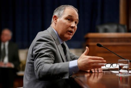 FILE PHOTO: Scott Pruitt, Environmental Protection Agency (EPA) Administrator, gestures as he testifies to the Senate Environment and Public Works Committee oversight hearing on the Environmental Protection Agency on Capitol Hill in Washington, DC, U.S., January 30, 2018.  REUTERS/Joshua Roberts/File Photo