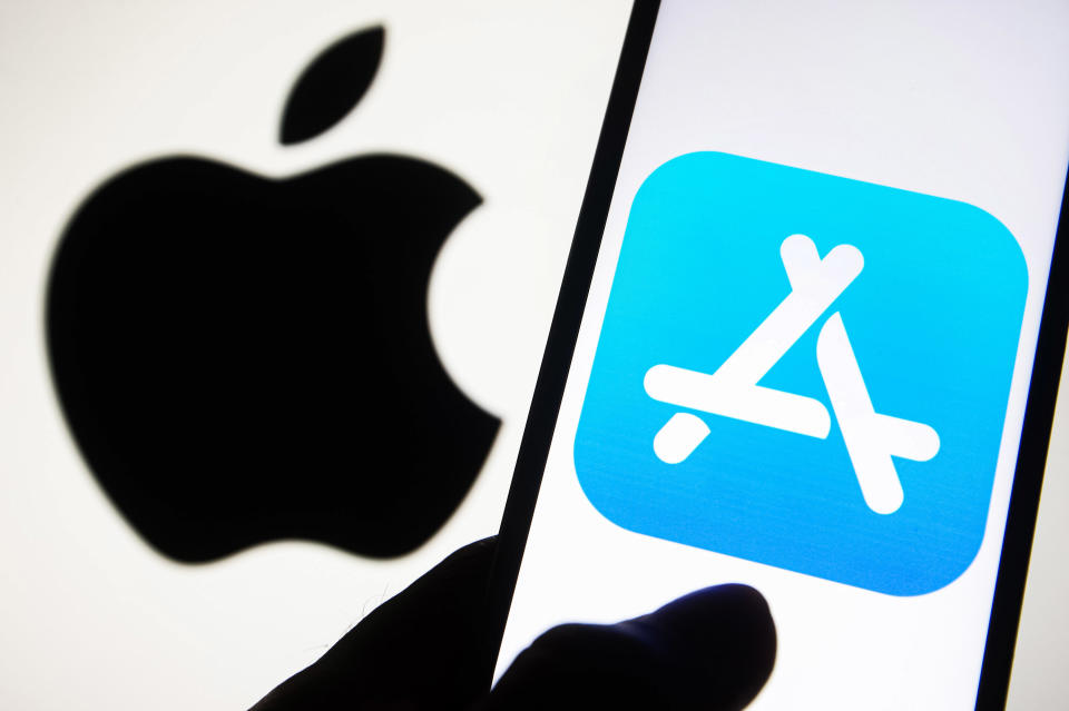 UKRAINE - 2021/09/23: In this photo illustration an App Store icon logo is seen on a smartphone screen with an Apple logo in the background. (Photo Illustration by Pavlo Gonchar/SOPA Images/LightRocket via Getty Images)