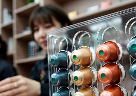 Starbucks labeled single-serve coffee capsules for Nespresso coffee makers are displayed after a news conference of Nestle start selling Starbucks-branded coffee in China, in Shanghai