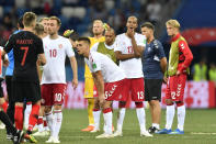 <p>Denmark players react after missing out on their attempt to reach the quarter finals </p>