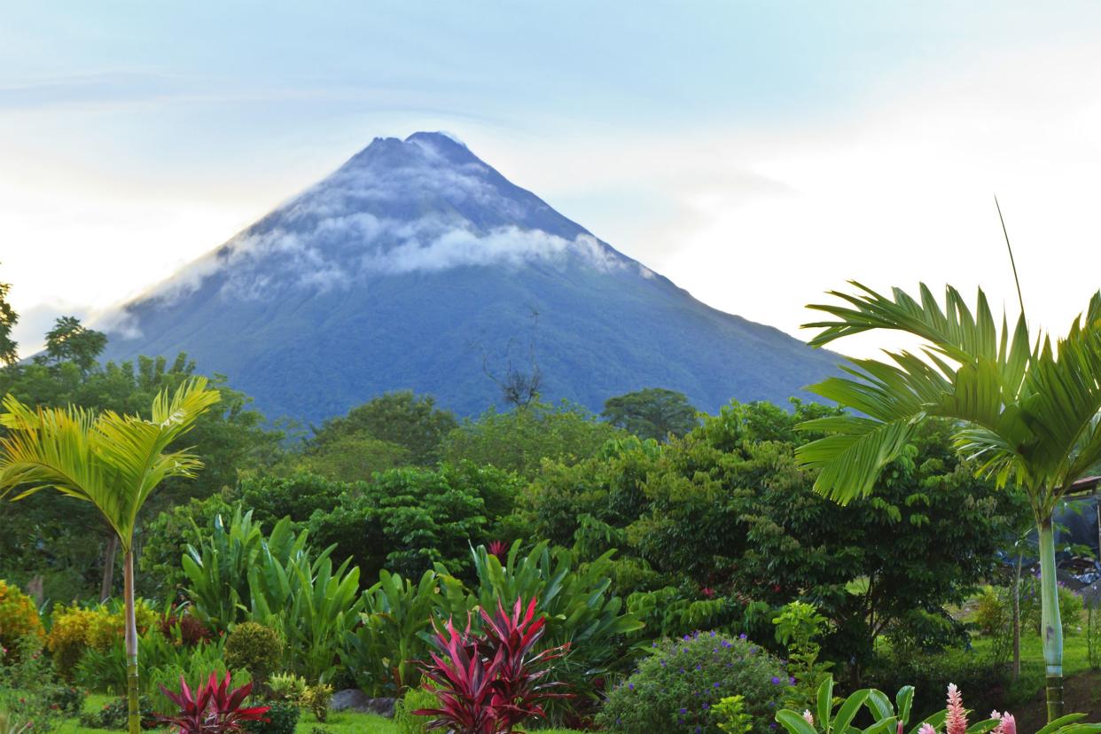 Arenal Volcano in wispy clouds