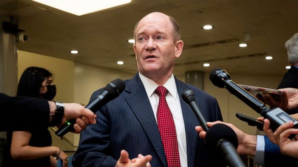 PHOTO: Sen. Chris Coons speaks with reporters near the Senate Subway at the U.S. Capitol. (Michael Brochstein/Sipa USA via AP, FILE)