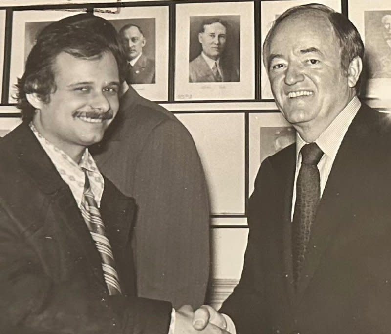 UPI reporter Frank Csongos shakes hands with Sen. Hubert Humphrey. Photo courtesy of Csongos family