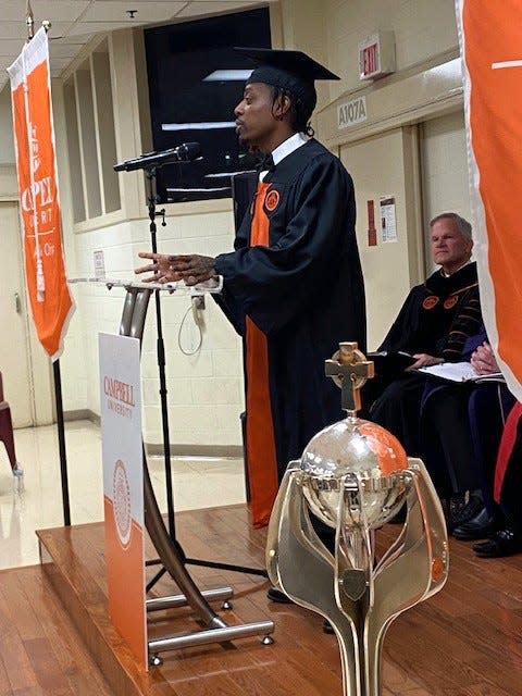 Brandon Pompey speaks to his fellow Campbell University graduates during commencement held on Thursday, Nov. 2, 2023 at Scotland Correctional Institution. The graduates are inmates at Sampson Correctional Institution and are part of the Second Chance Initiative, sponsored by the Bob Barker Foundation and operated by the Campbell and N.C. Dept. of Adult Correction.