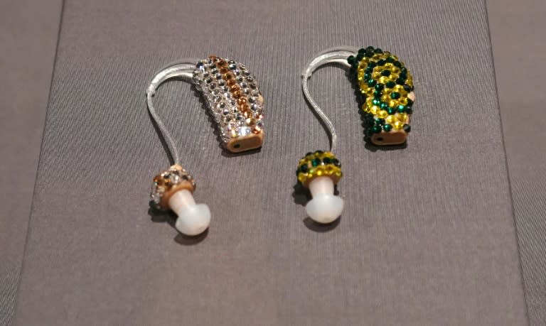 Bedazzled and Bejeweled Earring Aids, making a fashion statement, are displayed as part of the exhibit