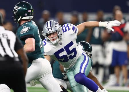 Dec 9, 2018; Arlington, TX, USA; Dallas Cowboys linebacker Leighton Vander Esch (55) pressures against Philadelphia Eagles quarterback Carson Wentz (11) in the fourth quarter at AT&T Stadium. Mandatory Credit: Matthew Emmons-USA TODAY Sports