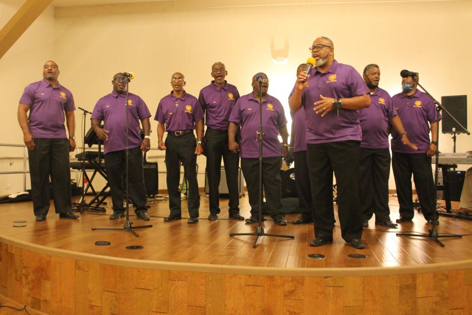 The Showers of Blessings Harvest Center Men of Blessings Male Choir perform during the Gospel Night at the Museum gospel extravaganza Friday night at the Cotton Club Museum and Cultural Center.