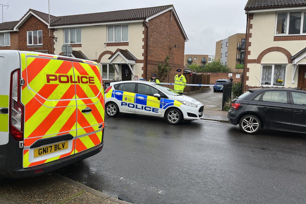 Police officers at the scene in Priory Road (Joseph Draper/PA) (PA Wire)