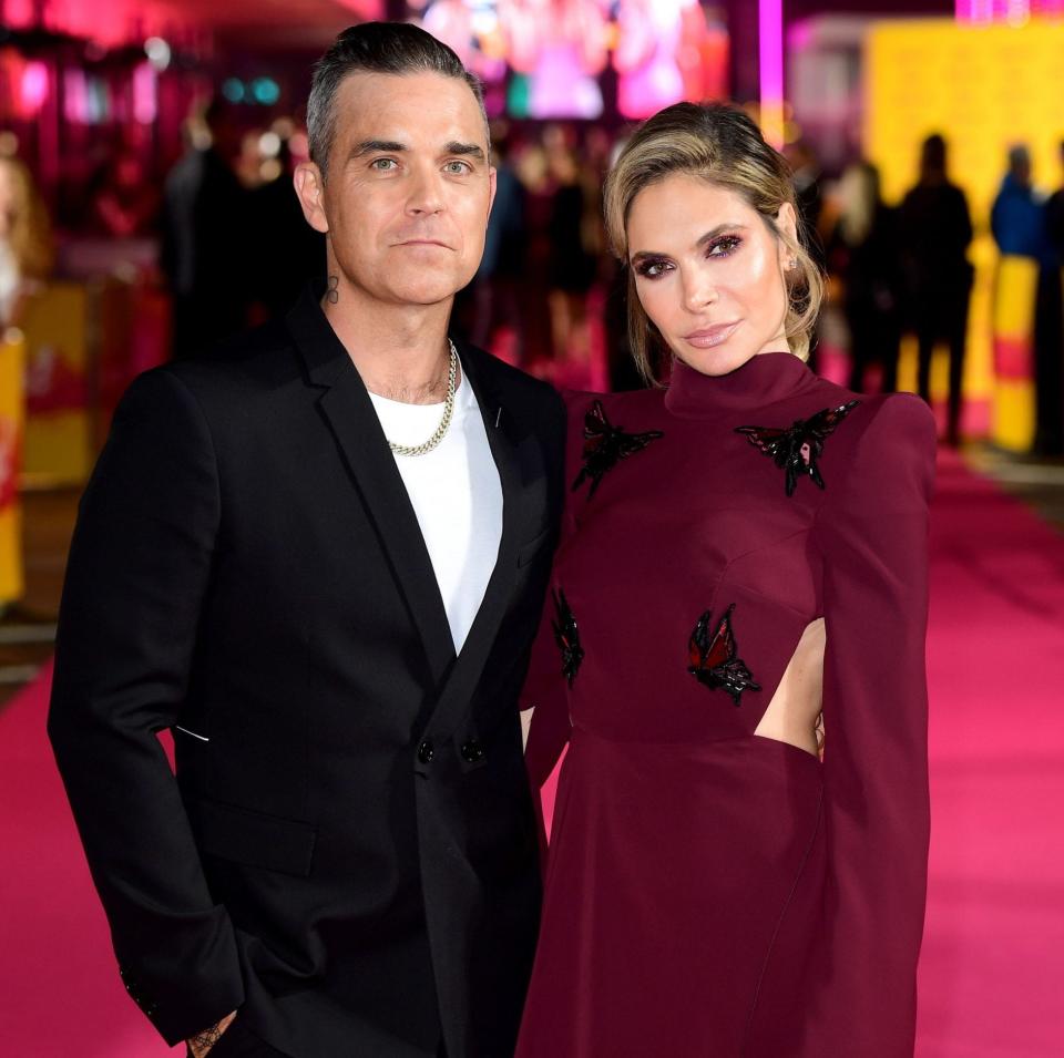 Life in the limelight: Robbie Williams and wife Ayda Field - PA