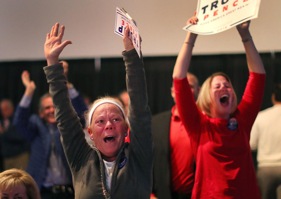 Donald Trump supporters are jubilant as Trump is to predicted to win North Carolina as they watched the election results at an election night watch party for Donald Trump supporters at the F1 indoor care racetrack ballroom in Braintree, Massachusetts, on Nov. 8.