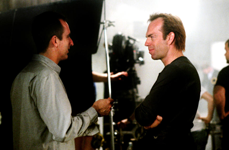 Director James McTeigue and a maskless Hugo Weaving on the set of 'V for Vendetta' (Photo 2006: Warner Brothers/courtesy Everett Collection)