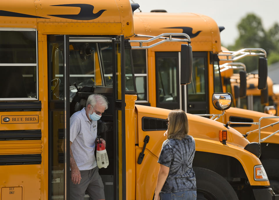 School bus drivers in Robeson Township, Penn., prepared for the start of the school year and new precautions during the coronavirus pandemic. (Photo: Ben Hasty/MediaNews Group/Reading Eagle via Getty Images)