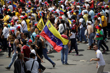 Opposition supporters attend a rally in support of political prisoners and against Venezuelan President Nicolas Maduro, in downtown Los Teques, Venezuela April 28, 2017. REUTERS/Marco Bello