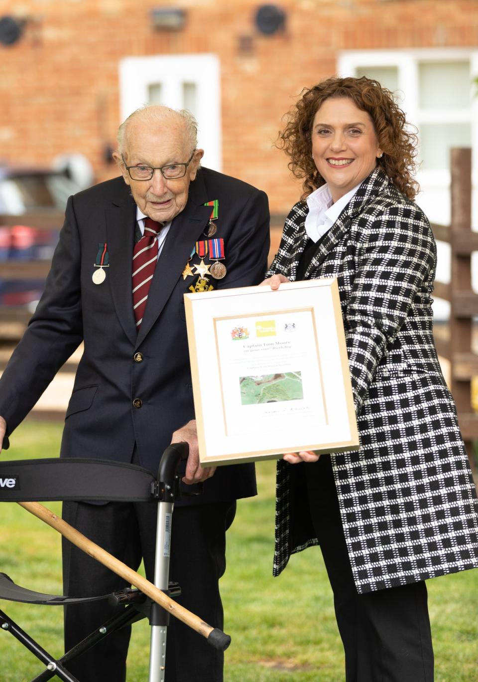 Sir Captain Tom Moore with his daughter Hannah as he celebrated his 100th birthday (Emma Sohl/Capture the Light Photography/PA) (PA Media)