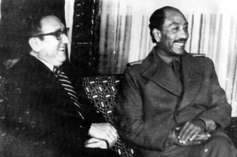 U.S. Secretary of State Henry Kissinger (L) meets with Egyptian President Anwar Sadat at his summer retreat on December 13, 1973. UPI File Photo