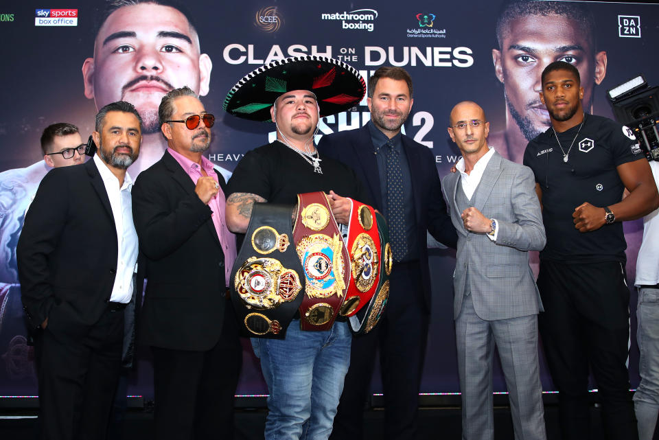 LONDON, ENGLAND - SEPTEMBER 06: Manny Robles, Andy Ruiz Sr, Andy Ruiz Jr, Eddie Hearn, Anthony Joshua  and Omar Khalil during the press conference for Andy Ruiz Jr. v Anthony Joshua 2 ‘Clash on the Dunes’ at the Hilton Syon Park on September 06, 2019 in London, England. Anthony Joshua and Andy Ruiz Jr will have a Heavyweight World Title rematch fight on December 7th 2019 in the historical town of Diriyah, Kingdom of Saudi Arabia. (Photo by Richard Heathcote/Getty Images)