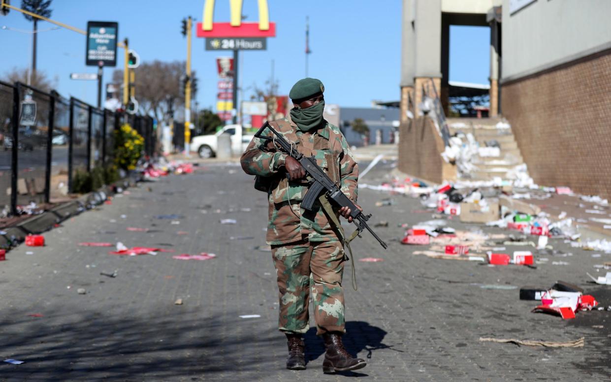 A member of the military patrols as the country deploys army to quell unrest linked to jailing of former President Jacob Zuma - Siphiwe Sibeko/Reuters