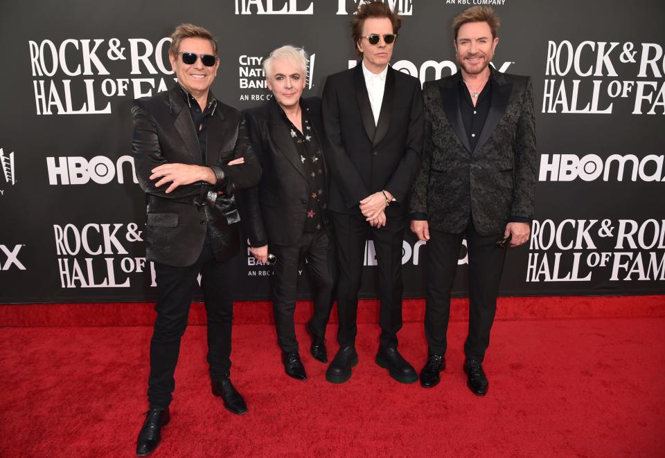 Roger Taylor, from left, Nick Rhodes, John Taylor and Simon Le Bon of Duran Duran arrive at the Rock & Roll Hall of Fame Induction Ceremony in 2022. The 1980s hitmakers hit FLA Live Arena on June 19.