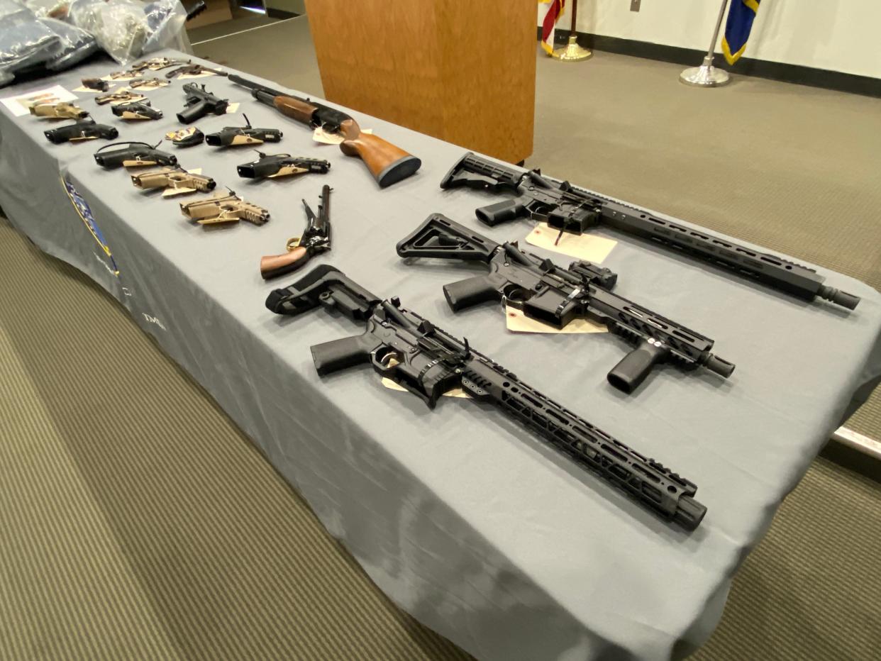 AR-15 rifles were among the array of weapons that Providence police displayed at a news conference earlier this month.