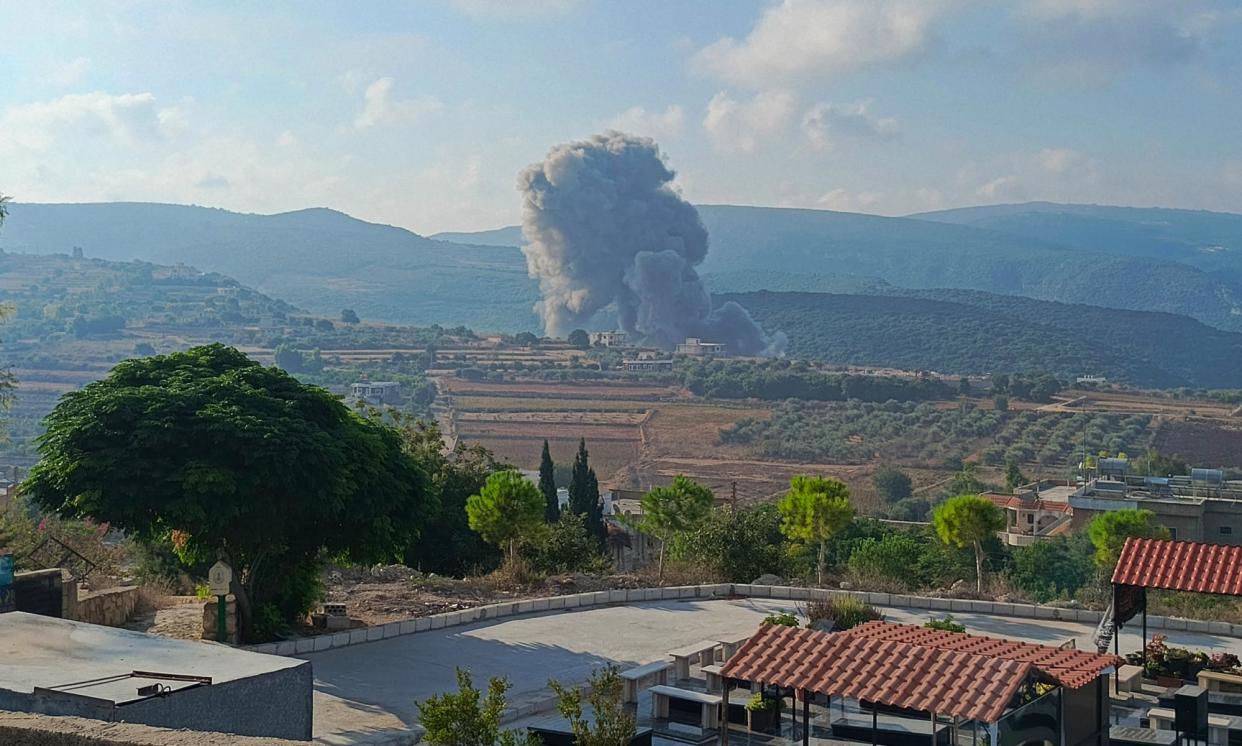 <span>Smoke billows from the site of an Israeli airstrike on Zibqin in southern Lebanon on Sunday, amid escalating cross-border tensions.</span><span>Photograph: Kawnat Haju/AFP/Getty Images</span>