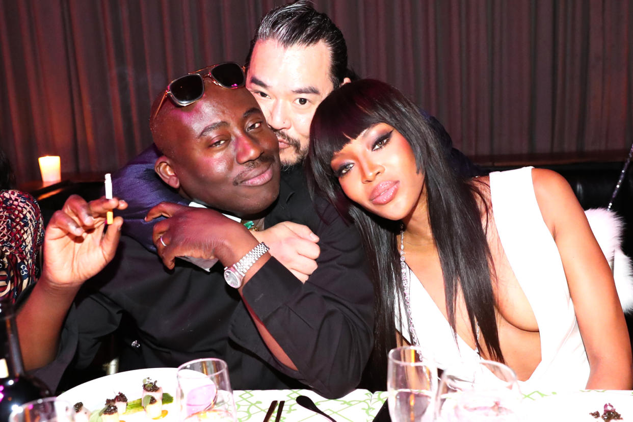 Edward Enninful with Melvin Chua and Naomi Campbell at Campbell's birthday celebrations in New York last year: Neil Rasmus/BFA/Rex