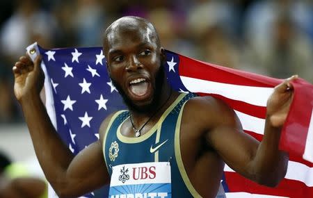 Lashawn Merritt of the U.S.celebrates winning the men's 400 metres event during the Weltklasse Diamond League meeting at the Letzigrund stadium in Zurich August 28, 2014. REUTERS/Ruben Sprich