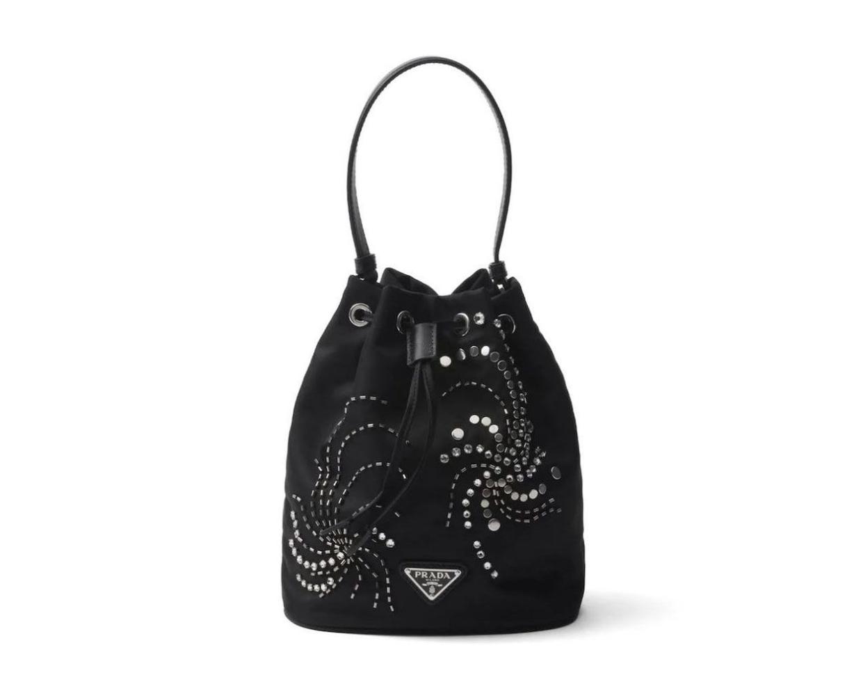 <p><a href="https://go.redirectingat.com?id=74968X1596630&url=https%3A%2F%2Fwww.farfetch.com%2Fshopping%2Fwomen%2Fprada-mini-re-nylon-bucket-bag-item-23046976.aspx&sref=https%3A%2F%2Fwww.townandcountrymag.com%2Fstyle%2Ffashion-trends%2Fa46106296%2F2024-bag-trends%2F" rel="nofollow noopener" target="_blank" data-ylk="slk:Shop Now;elm:context_link;itc:0;sec:content-canvas" class="link rapid-noclick-resp">Shop Now</a></p><p>Mini Re-Nylon Bucket Bag</p><p>farfetch.com</p><p>$2450.00</p>