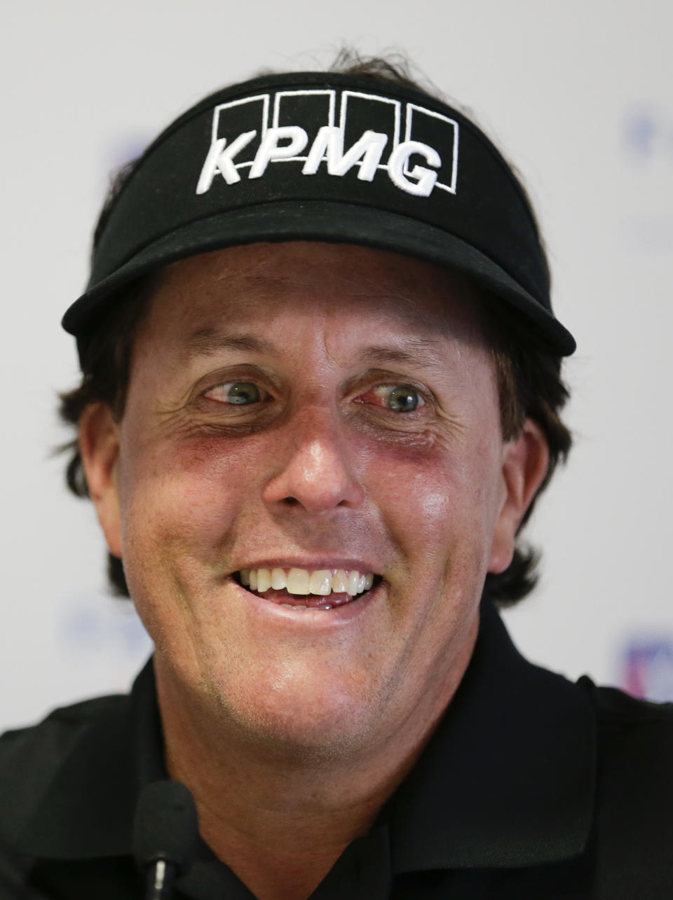 Phil Mickelson talks to the media during a news conference at the Farmers Insurance Open golf tournament at Torrey Pines Golf Course on Wednesday, Jan. 22, 2014, in San Diego. (AP Photo/Chris Carlson)