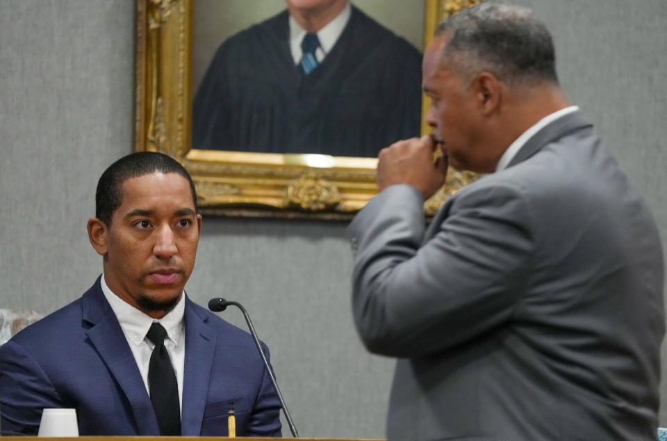 Prosecutor Dexter Gilford, right, questions APD officer Darrell Cantu-Harkless, left, about Austin Police Officer Christopher Taylor during a murder trial at the Blackwell-Thurman Criminal Justice Center on Wednesday October 25, 2023. APD officer Darrell Cantu-Harkless was an officer who responded to a call of Michael Ramos. Taylor is charged with killing of Michael Ramos in 2020.