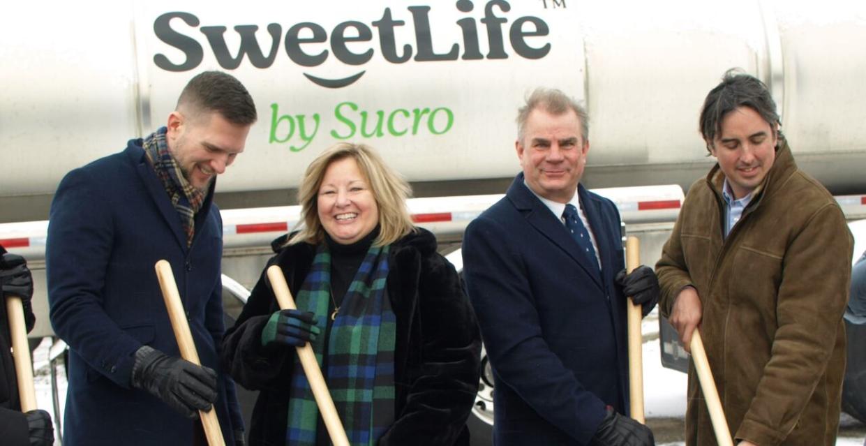 Officials celebrate the SucroCan announcement on Tuesday. From left: Hamilton Oshawa Port Authority board member Keanin Loomis; Ontario minister of Agriculture, Food and Rural Affairs Lisa Thompson; port authority president and CEO Ian Hamilton; and SucroCan founder and CEO Jonathan Taylor.  (Saira Peesker/CBC - image credit)