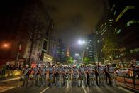 <p>Police face off against Rousseff supporters at a rally at Avenida Paulista when President Dilma Rousseff was questioned on the Senate floor during her impeachment trial on August 30, 2016 in Sao Paulo, Brazil. (Cris Faga/NurPhoto via Getty Images) </p>