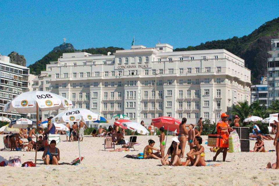 <p>Interfoto/Alamy</p> Rio de Janeiro’s Copacabana Palace overlooks the iconic Copacabana Beach.