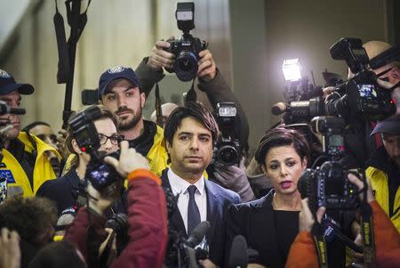 Canadian celebrity radio host Jian Ghomeshi leaves court after getting bail on multiple counts of sexual assault in Toronto November 26, 2014. REUTERS/Mark Blinch