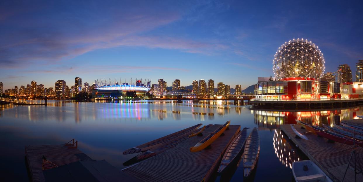 Vancouver Science World and BC Stadium at night