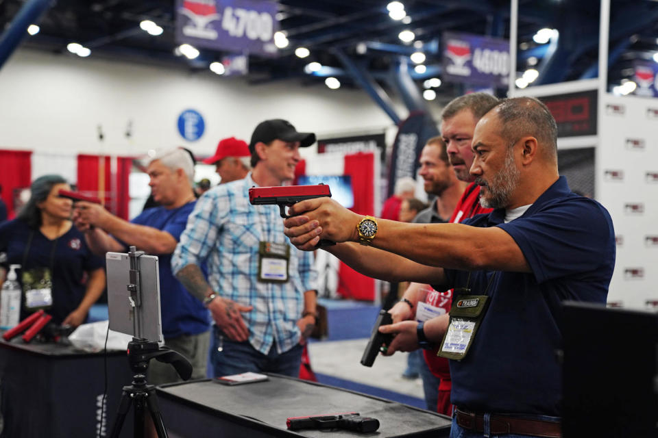Visitors at the 2022 NRA convention in Houston. (Allison Dinner for NBC News)
