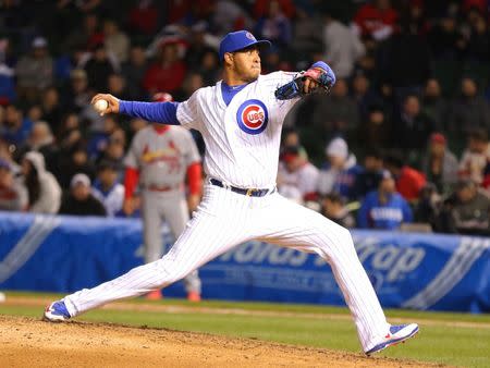 Apr 5, 2015; Chicago, IL, USA; Chicago Cubs relief pitcher Hector Rondon (56) delivers a pitch during the ninth inning against the St. Louis Cardinals at Wrigley Field. Dennis Wierzbicki-USA TODAY Sports