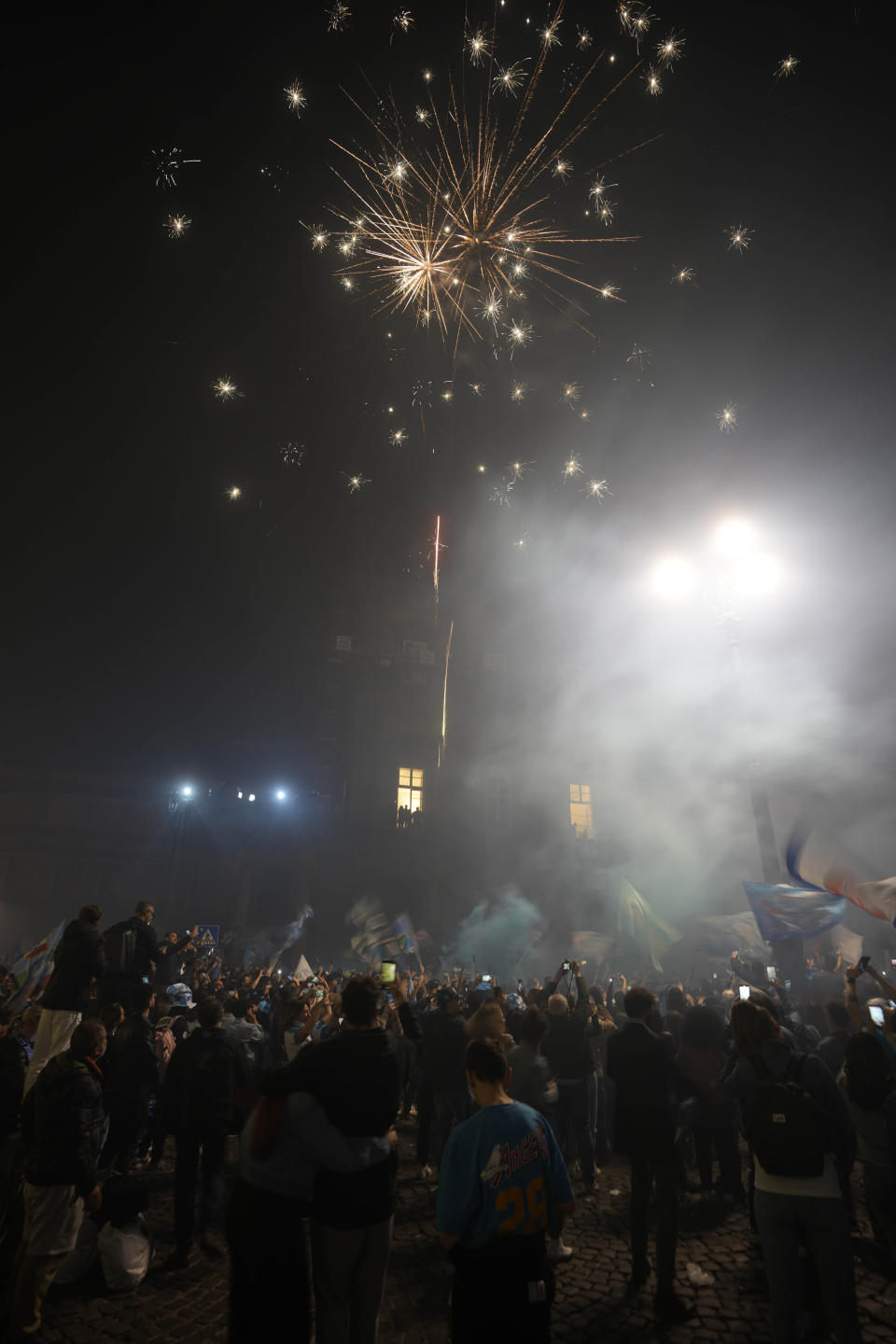 Napoli fans celebrates after winning the Italian league soccer title, in Naples, Italy, Thursday, May 4, 2023. Napoli won its first Italian soccer league title since the days when Diego Maradona played for the club, sealing the trophy with a 1-1 draw at Udinese on Thursday. (AP Photo/Andrew Medichini)