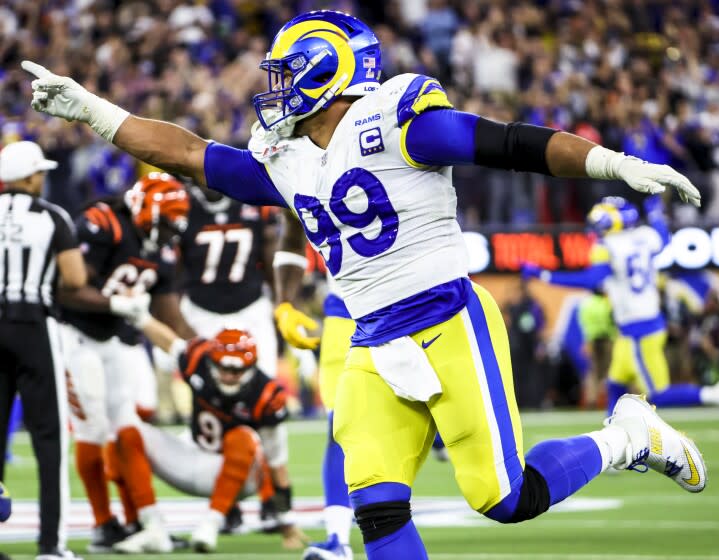 Los Angeles Rams defensive end Aaron Donald (99) celebrates his sack of Cincinnati Bengals quarterback Joe Burrow