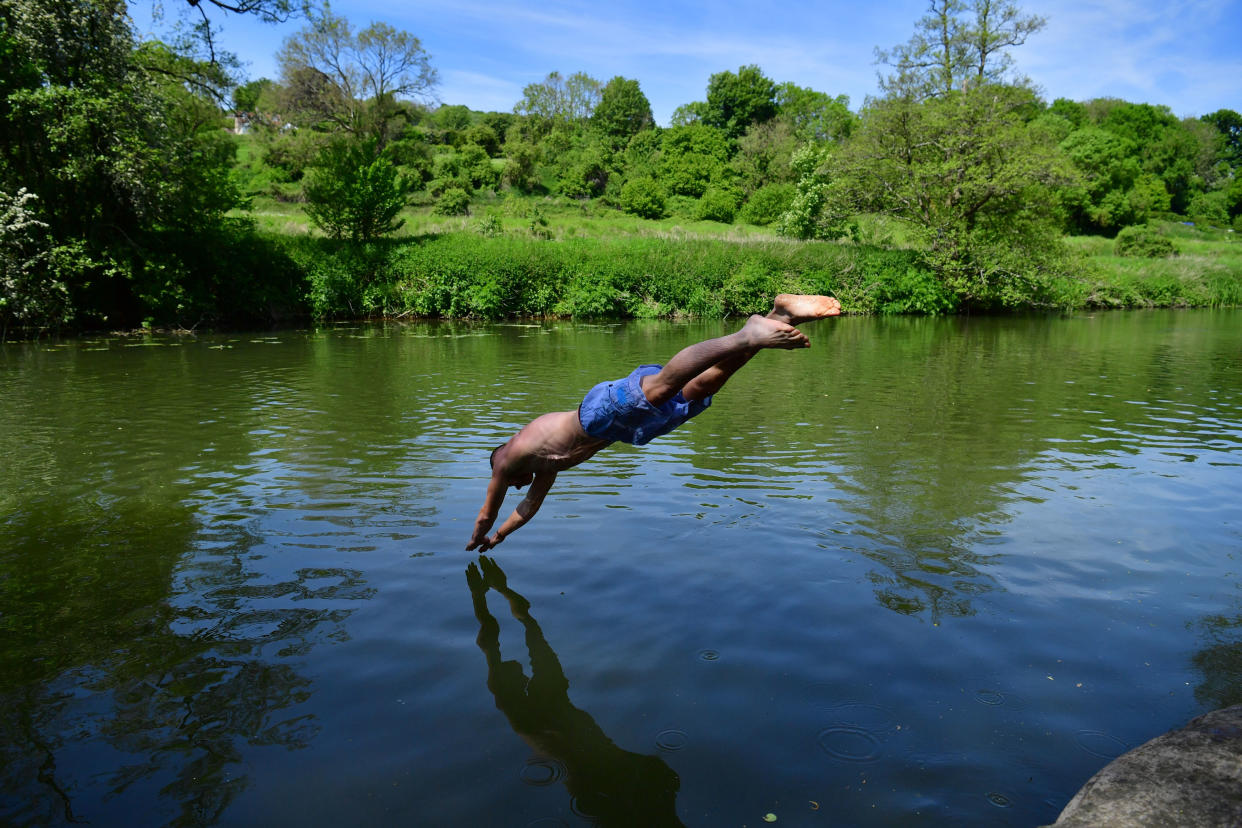 Swimmers enjoy the hot weather