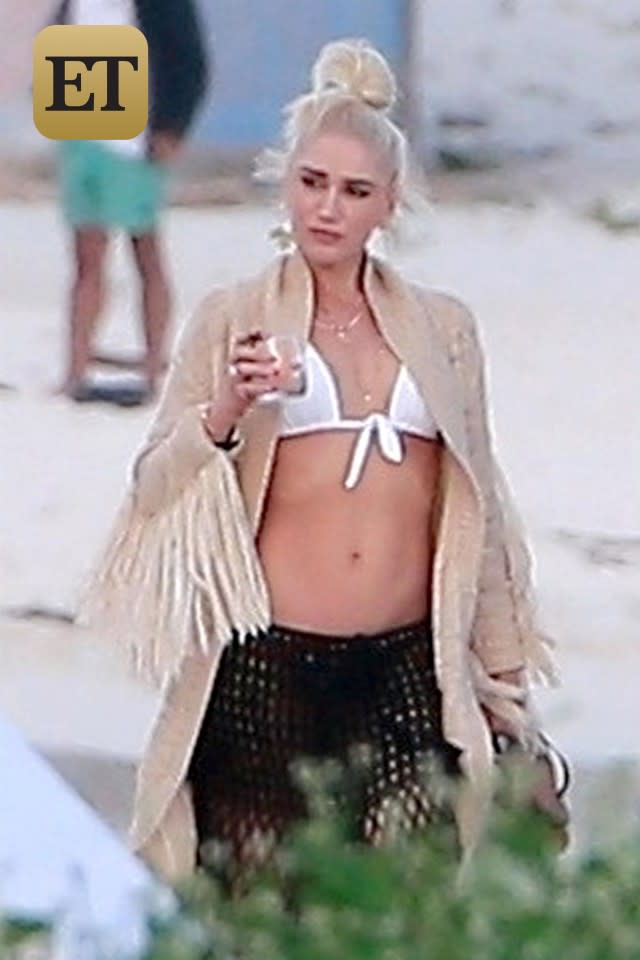 The 48-year-old singer showed off her fit figure while vacationing with Blake Shelton in Playa del Carmen, Mexico.