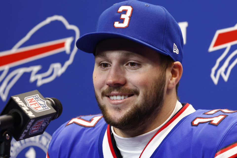 Buffalo Bills quarterback Josh Allen talks to reporters after an NFL wild-card playoff football game against the Miami Dolphins, Sunday, Jan. 15, 2023, in Orchard Park, N.Y. (AP Photo/Jeffrey T. Barnes)