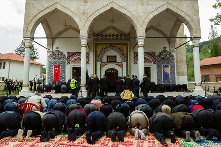Believers pray after opening ceremony of the Aladza Mosque, that was demolished at the beginning of the Bosnian war in Foca, Bosnia and Herzegovina, May 4, 2019. REUTERS/Stevo Vasiljevic