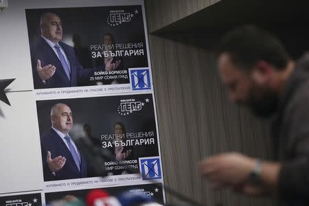 A pre-election poster of the former Bulgarian prime minister and leader of centre-right GERB party Boiko Borisov is seen before a news conference at the party's headquarters in Sofia, Bulgaria March 26, 2017. REUTERS/Stoyan Nenov