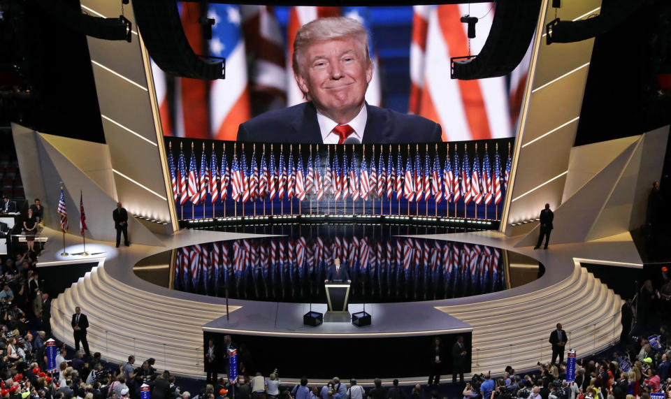 FILE - In this July 21, 2016, file photo, Republican presidential candidate Donald Trump smiles as he addresses delegates during the final day session of the Republican National Convention in Cleveland. Four years ago, Donald Trump accepted the Republican Party’s nomination for president with a dark convention speech that painted a dystopic portrait of an America in decline. And he offered a singular solution. His message was “I alone can fix it.” (AP Photo/Patrick Semansky, File)