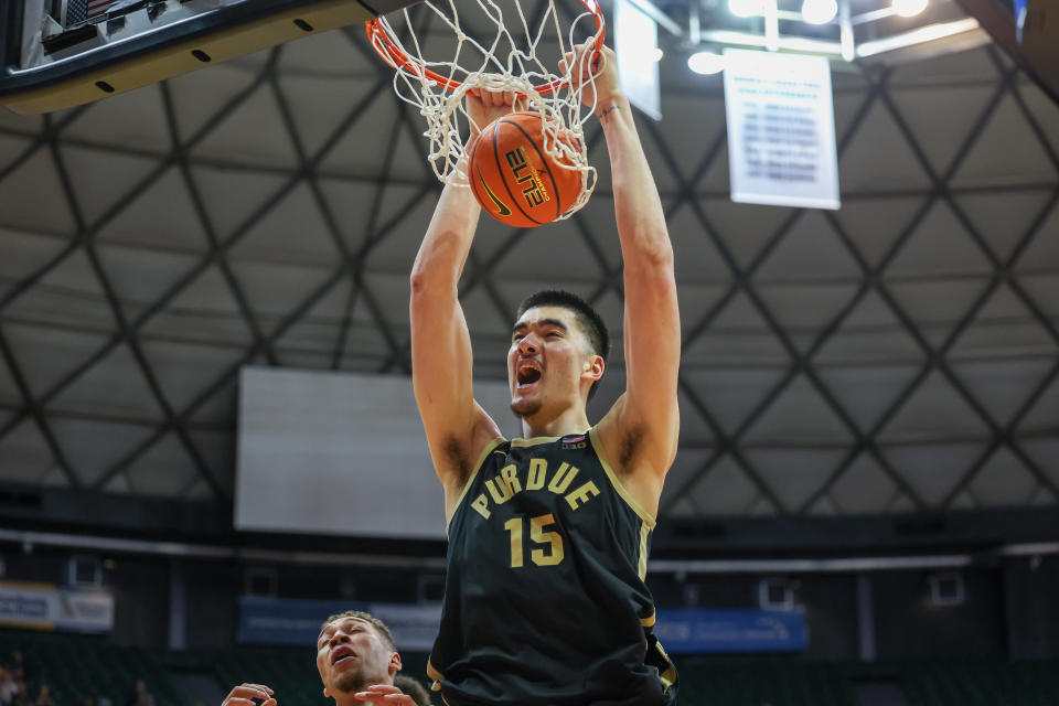 HONOLULU, HAWAII - NOVEMBER 22: Zach Edey #15 of the Purdue Boilermakers lets out a yell as he throws down a dunk during the second half of their game against the Marquette Golden Eagles in the Allstate Maui Invitational at SimpliFi Arena on November 22, 2023 in Honolulu, Hawaii. (Photo by Darryl Oumi/Getty Images)